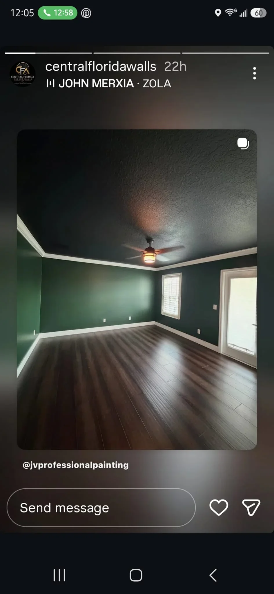 Interior room with forest green walls, white trim, dark ceiling, and hardwood flooring